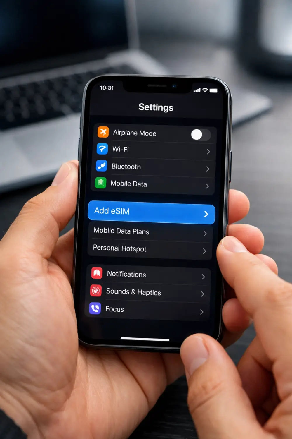 Black iPhone with glossy finish showing eSIM settings menu